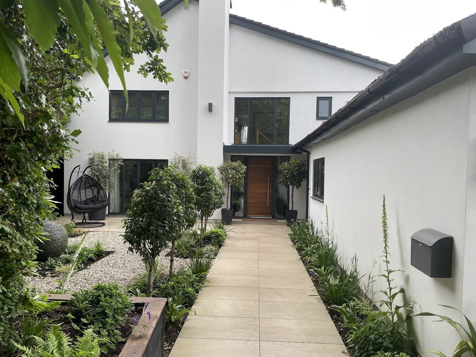 The discreet clinic exterior and garden path